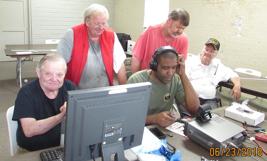 1A W5WQ F D operating station l to r seated Bob K5DWI, Patrick KD5JXD and William KG5AAB standing l to r Jeffery N5ZNT and Donnie KD5RGT
